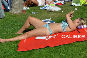 Milf-bikini-spread-her-legs-in-the-grass-p2c53ameus.jpg